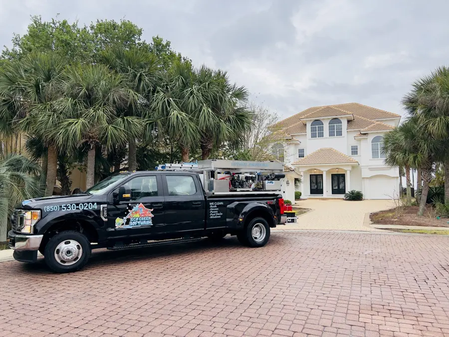 Work truck at a stucco home